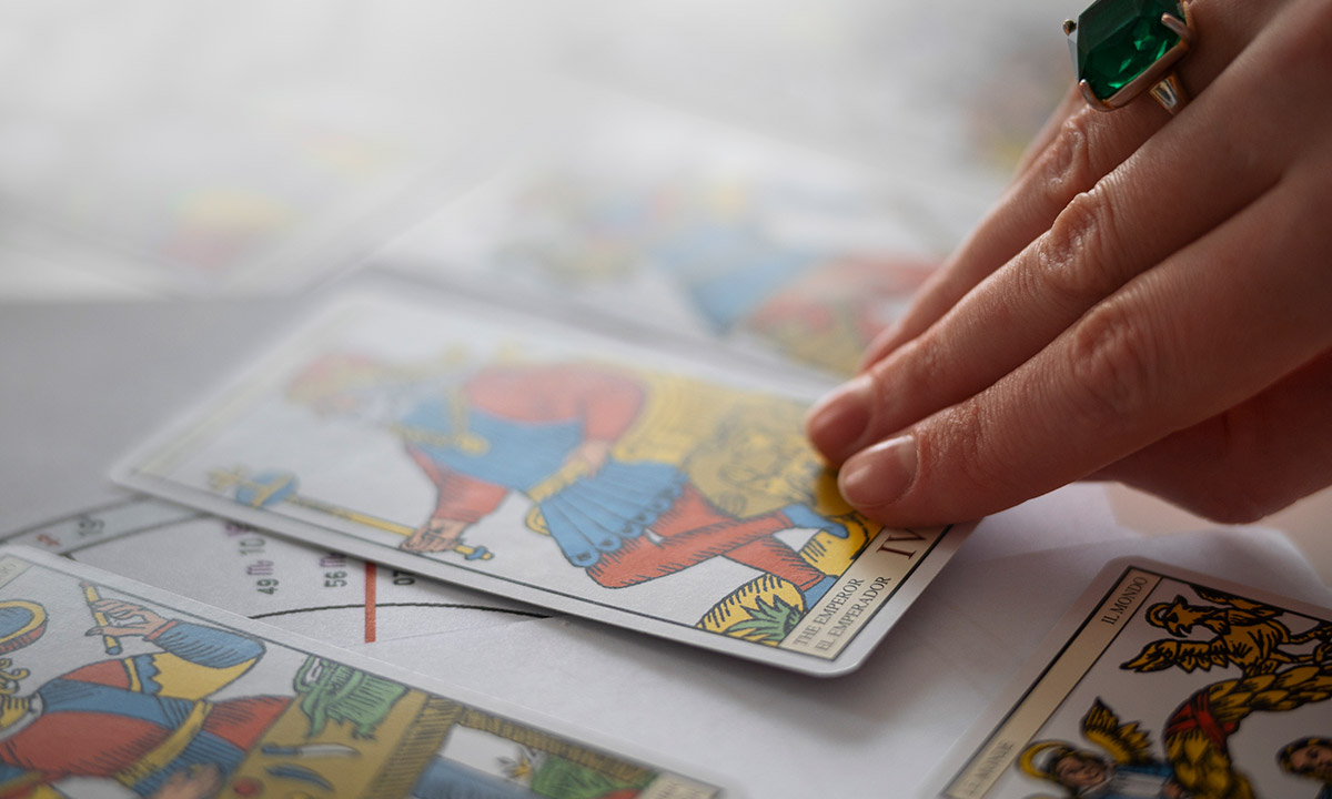high-angle-woman-reading-tarot
